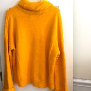 gold turtleneck sweater
